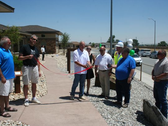 Evolution Homes celebrates opening of Millenia