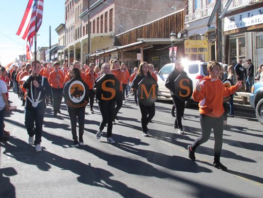 Fernley Girl Scouts, Silverland Middle School band march in Virginia City Veterans Day Parade