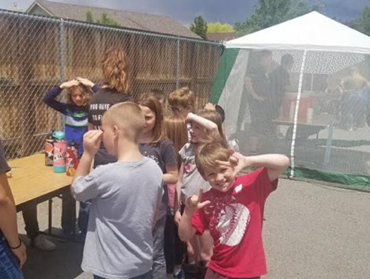 FHS Spanish II students host Spanish Carnival for EVES 2nd graders