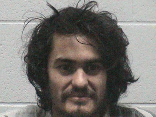 Man charged with destruction of property after throwing rocks at restaurant windows