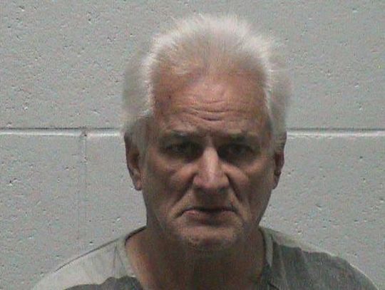 Man charged with pointing gun at deputy