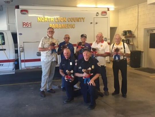 Moose Lodge donates Tommy Moose dolls to fire department