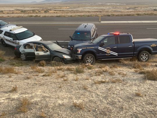 NHP says driver in pursuit tried to run over NDOT workers