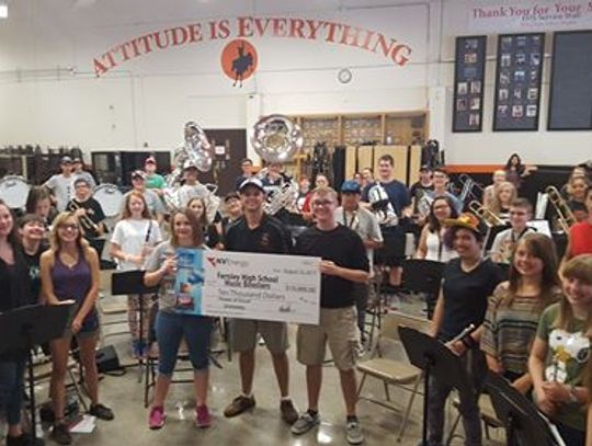 NV Energy presents check to Fernley band