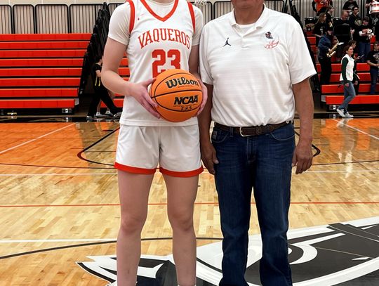 Softball star Tollestrup sets basketball scoring standard