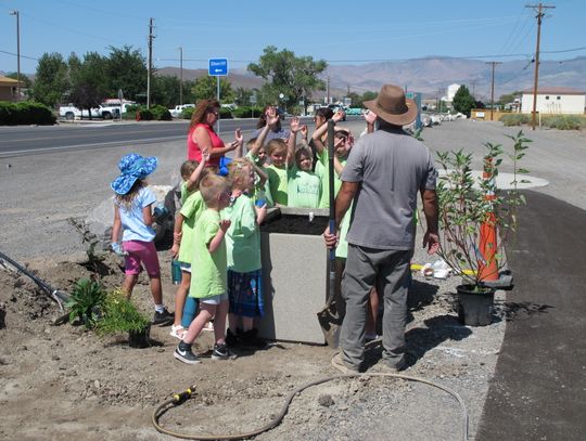 Volunteers dig in at Main Street Art Park