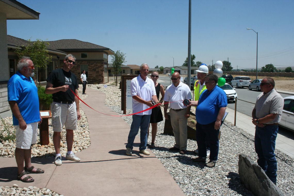 Evolution Homes celebrates opening of Millenia