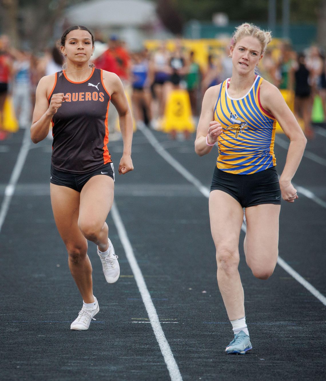 Fernley’s Justice Martell-Artiaga runs the 100 meters during last week’s meet at Reed. Photo by  Ron Perkins - Petersen, Esparza lead Fernley with event wins at Reed Invitational