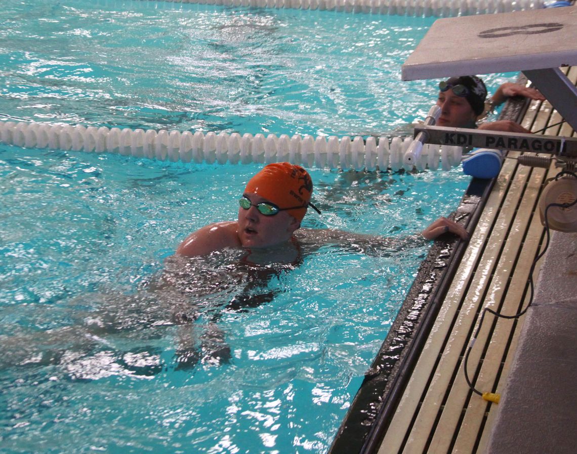 Fernley swimmer overcomes scoliosis to place at State