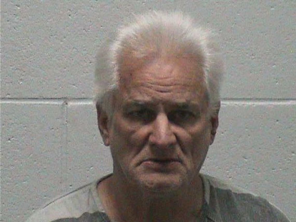 Man charged with pointing gun at deputy
