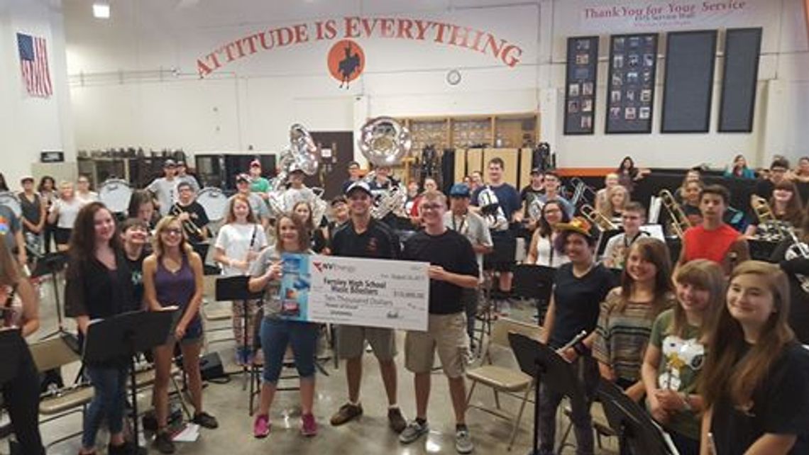 NV Energy presents check to Fernley band