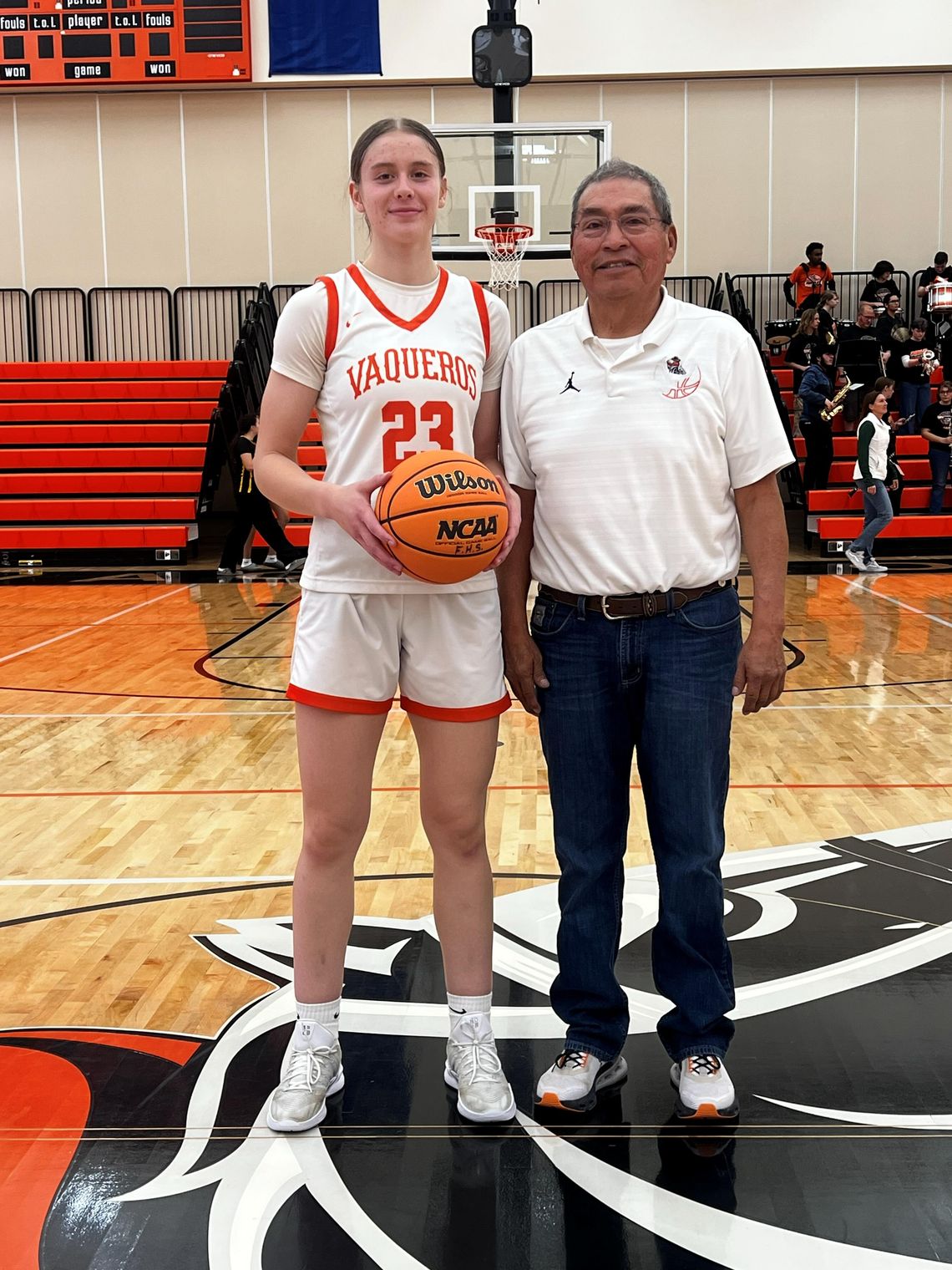 Softball star Tollestrup sets basketball scoring standard