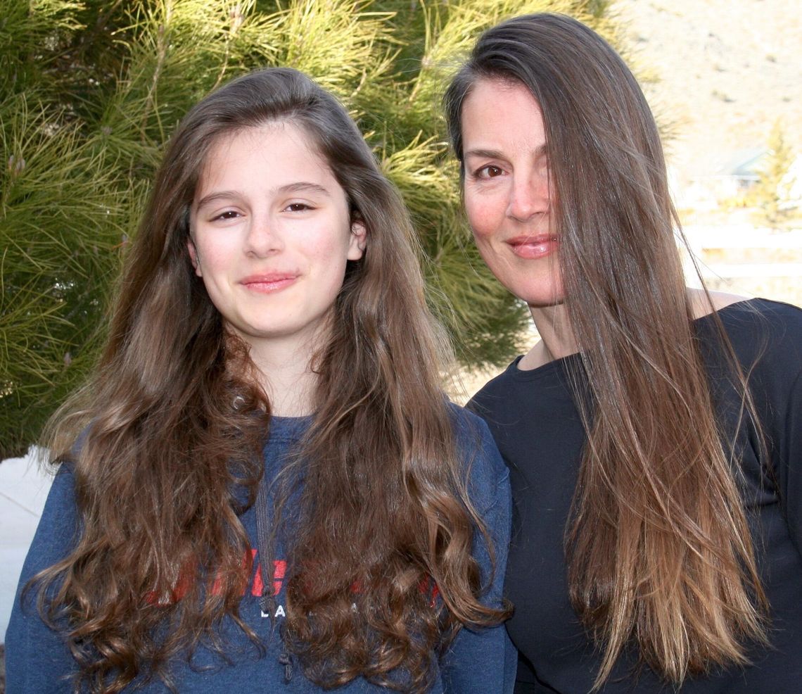 WNC instructor, daughter shave heads for cancer causes